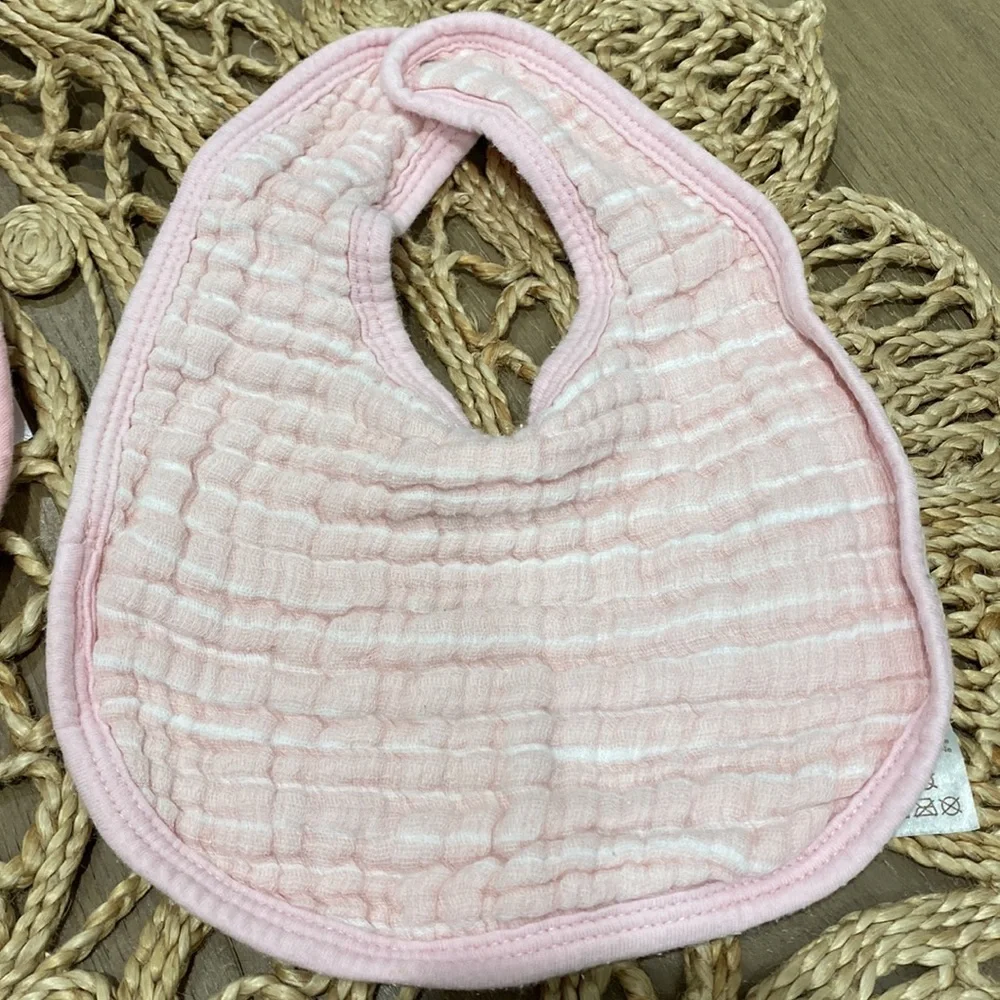 Bundle up with five baby girl bibs